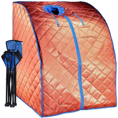 portable orange sauna tent with a folded chair