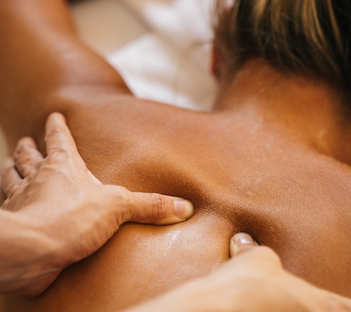 women getting a back massage