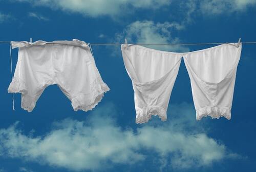 underwear hanging under clear blue sky